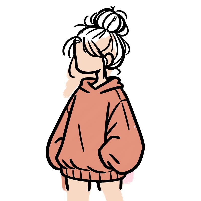 girl with baggy sweatshirt and messy bun