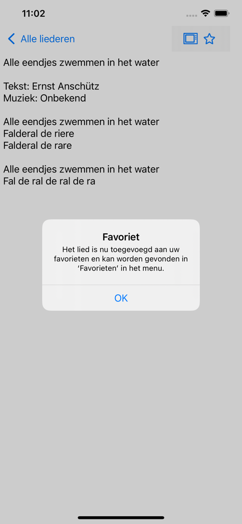 A screenshot of the Liedboek app showing the lyrics for a Dutch children's song and a notification confirming it has been added to favorites.
