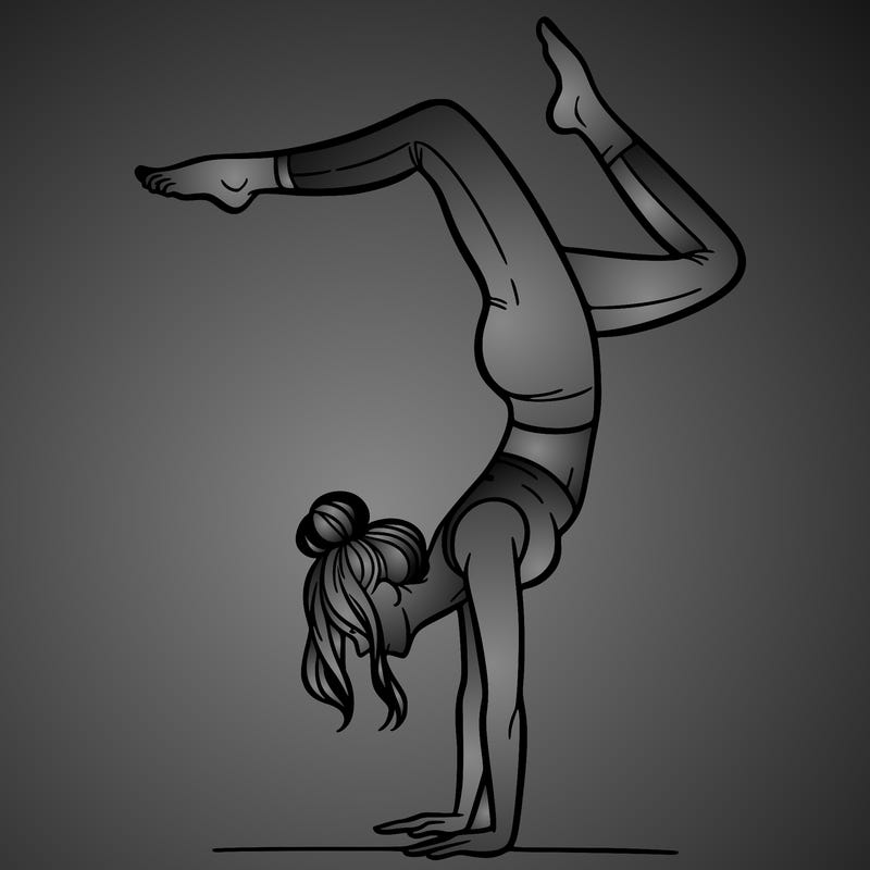 a woman doing a handstand