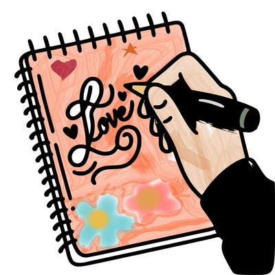 a hand writing “love” in calligraphy on a notebook