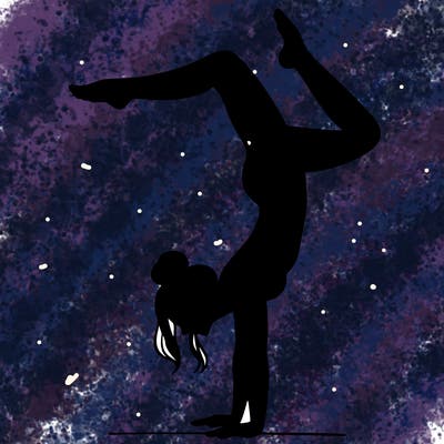 a woman doing a handstand