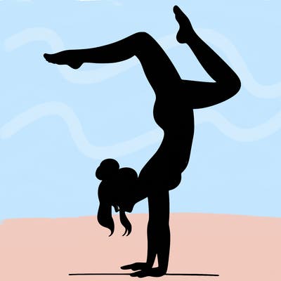 a woman doing a handstand
