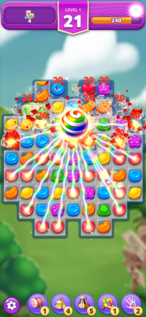 Lollipop2 & Marshmallow Match3 - Rainbow candy powerup clearing a colorful puzzle board in Lollipop 2 match 3 game