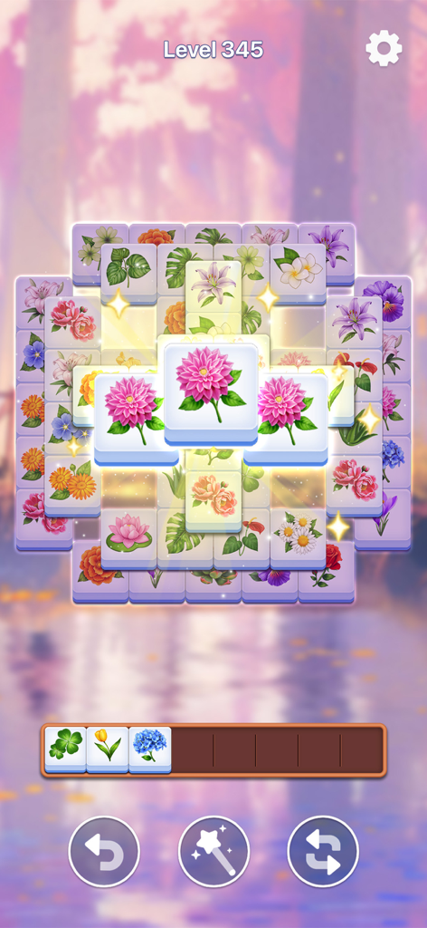 Bloom Tile match three puzzle gameplay with floral tiles