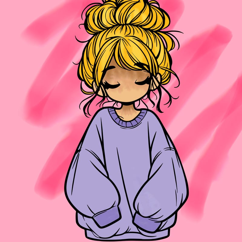 girl with baggy sweatshirt and messy bun