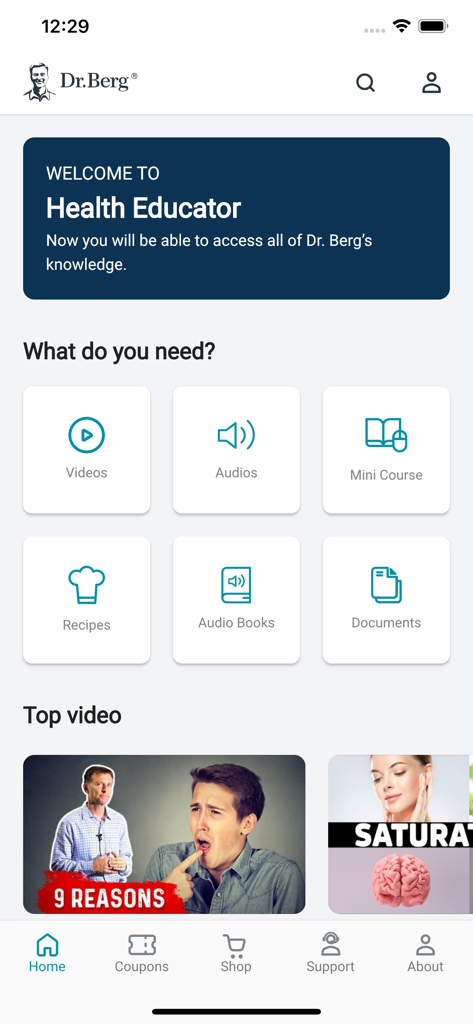 Dr. Berg - Dr Berg health app home screen showing educational categories and video content