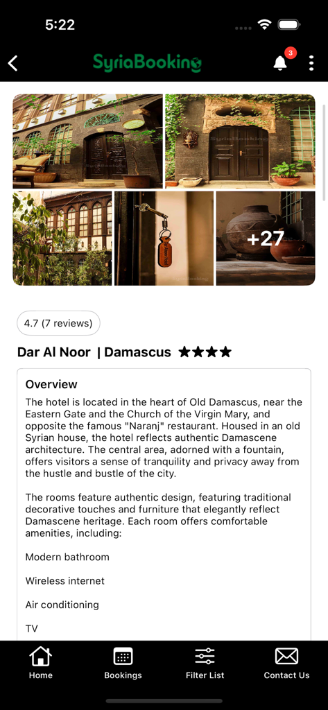 SyriaBooking - SyriaBooking app screen showing the overview and photo gallery for Dar Al Noor hotel in Damascus.