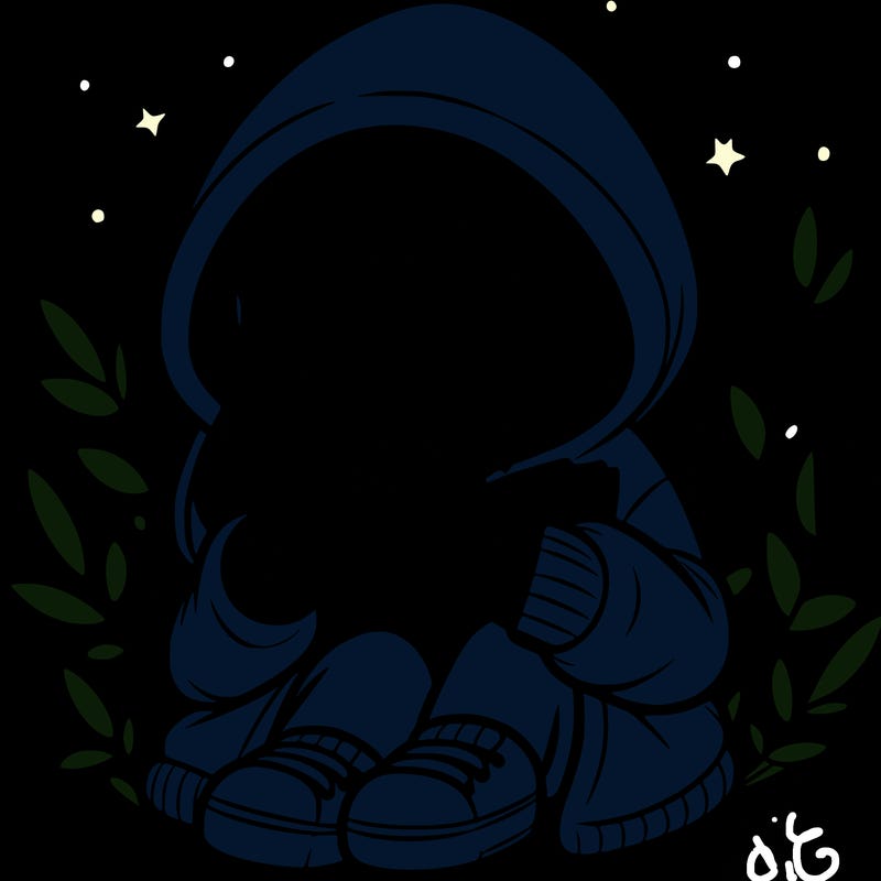 girl in oversized hoodie reading a book