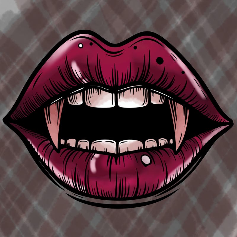 lips with vampire teeth