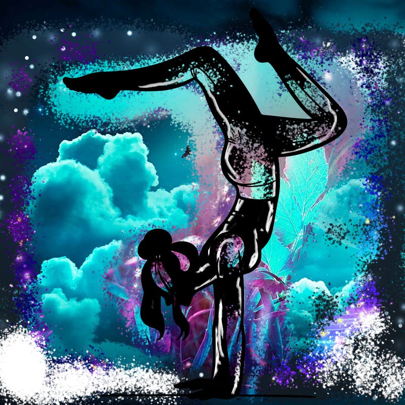 a woman doing a handstand