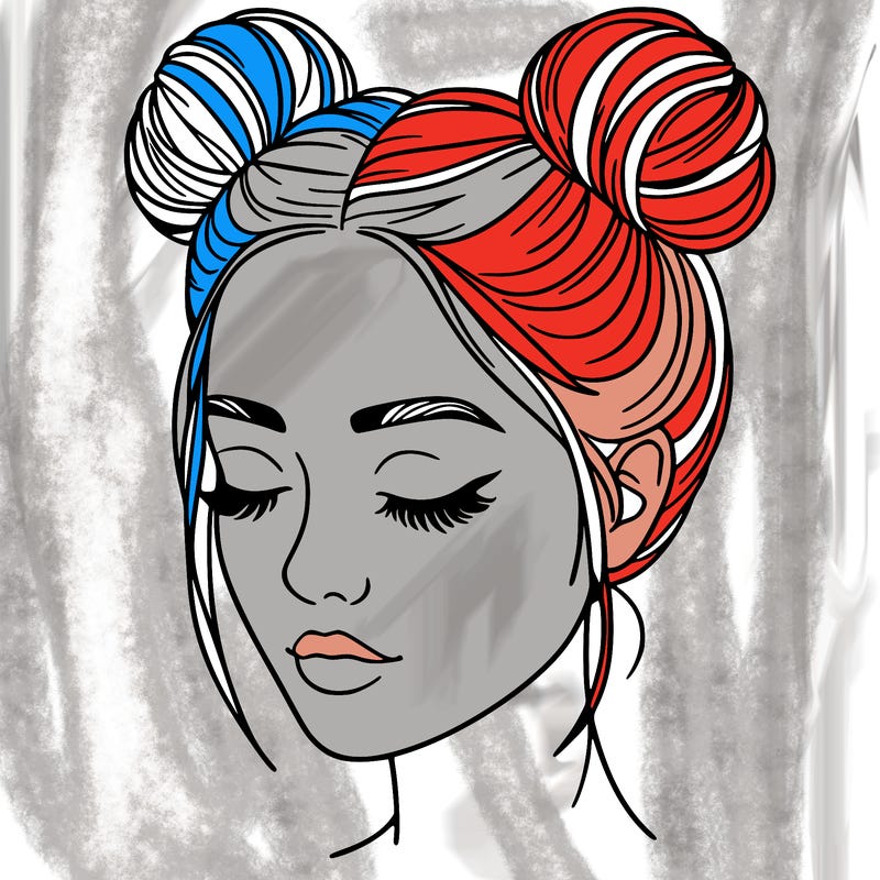 woman with hair buns