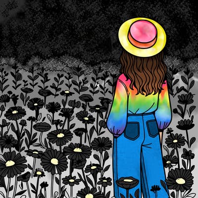 a woman in a field of flowers