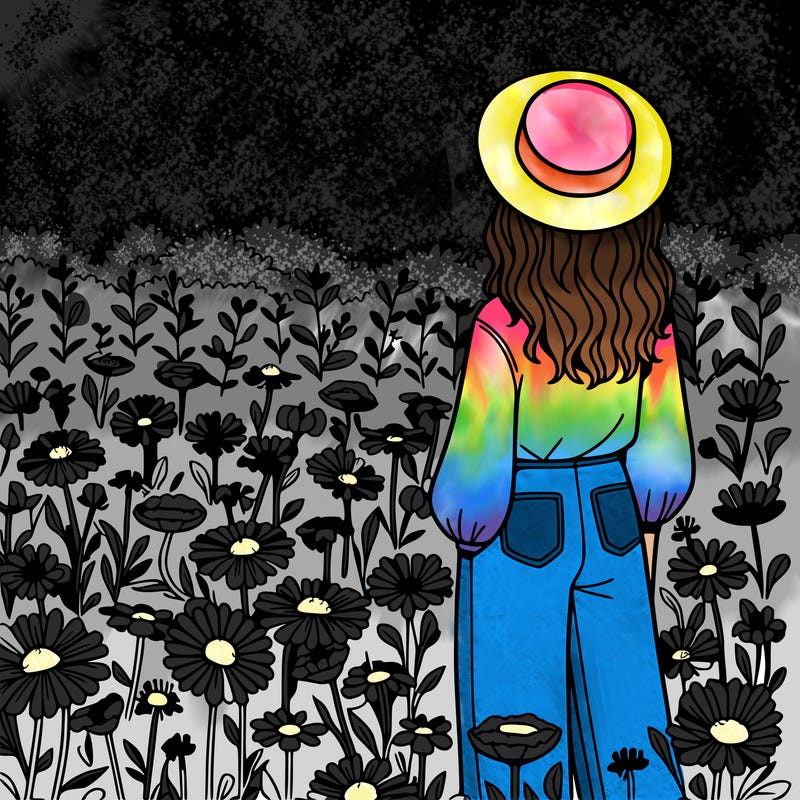 a woman in a field of flowers