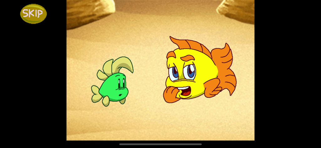 Freddi Fish 5: Coral Cove - Freddi Fish y Luther hablando en una escena del juego Freddi Fish 5 Coral Cove