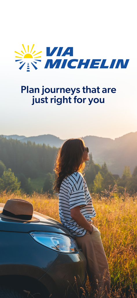 ViaMichelin app welcome screen featuring a woman leaning on a car overlooking a mountain landscape