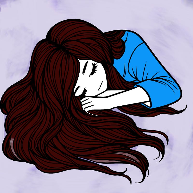 a relistic girl with long hair laid out while laying down with hair flipped out