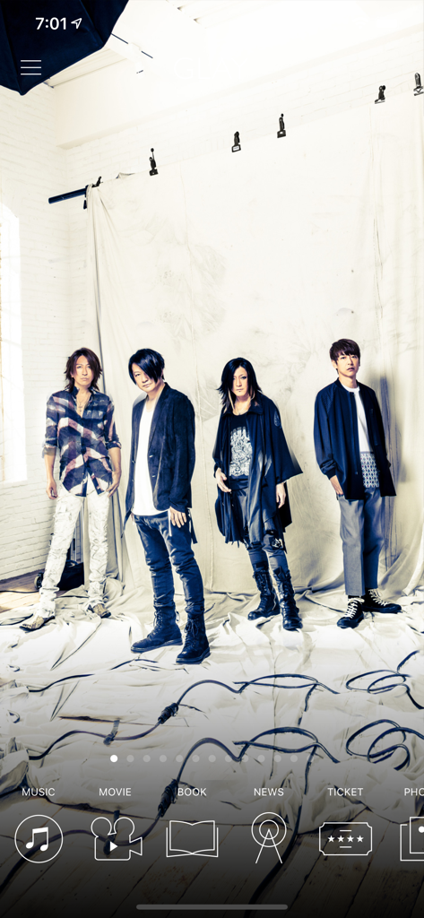 Official GLAY app home screen featuring the band members and navigation icons for music, movies, and news.
