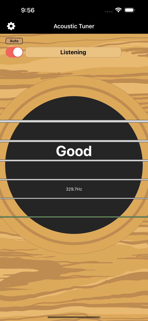 Acoustic Tuner - Acoustic Tuner app interface showing a guitar soundhole graphic and an in-tune indicator