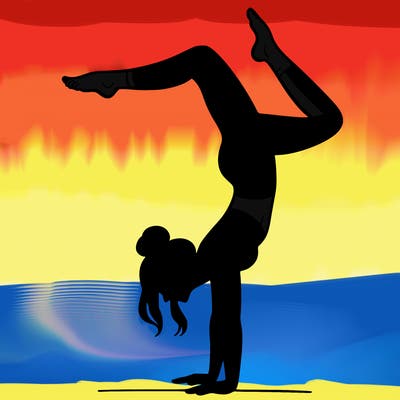 a woman doing a handstand