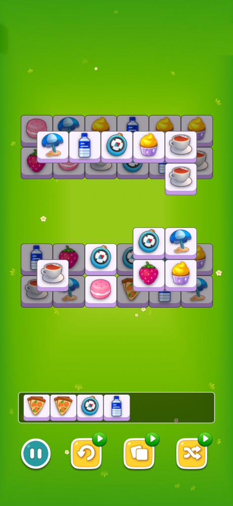 Triple Tile Puzzle- Connect 3 - Interfaz de juego de Triple Tile Puzzle que muestra varias fichas de comida y objetos sobre un fondo verde