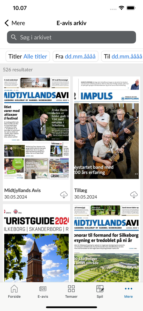 Midtjyllands Avis - Digital newspaper archive screen in the Midtjyllands Avis app showing various edition covers and search filters