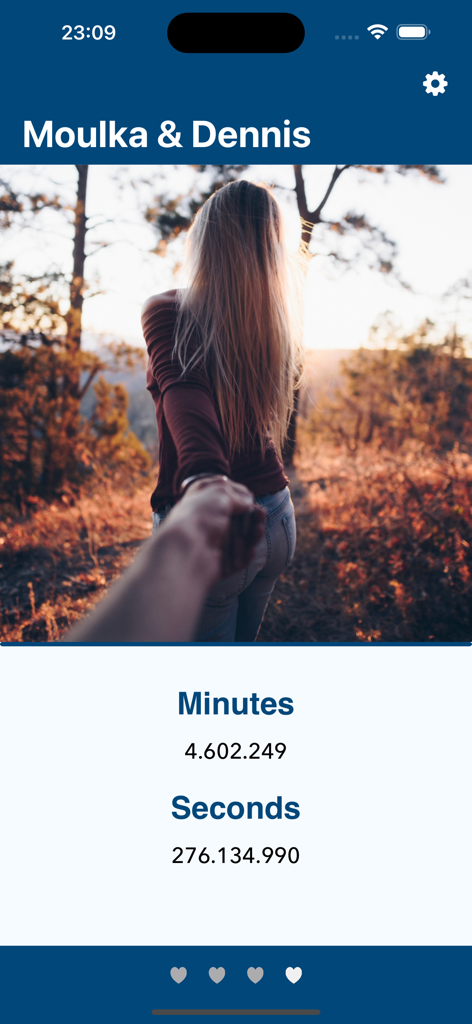 LoveCounter - My Love - LoveCounter app interface displaying relationship duration in minutes and seconds with a romantic photo of a couple.