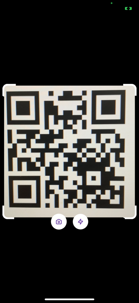 QRCode Scanner T - A mobile app interface scanning a QR code using a viewfinder and camera controls