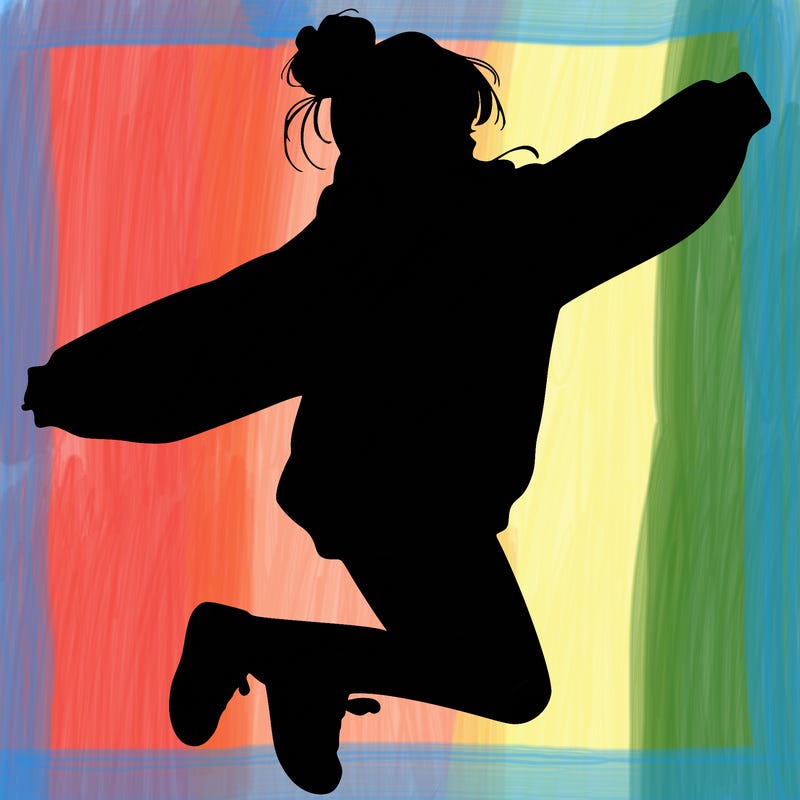 realistic girl jumping with a bun and oversized sweatshirt