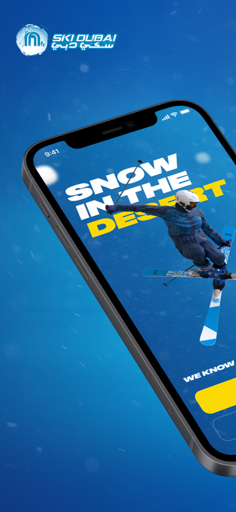 사막의 눈이라는 문구와 함께 스키어가 점프하는 모습을 보여주는 스키 두바이 모바일 앱