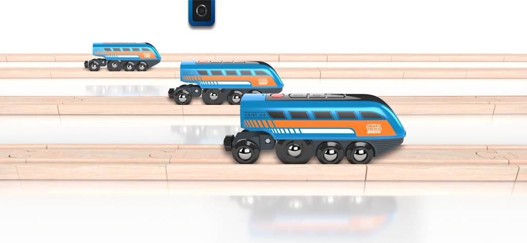Three blue BRIO Smart Tech Sound engines on wooden railway tracks