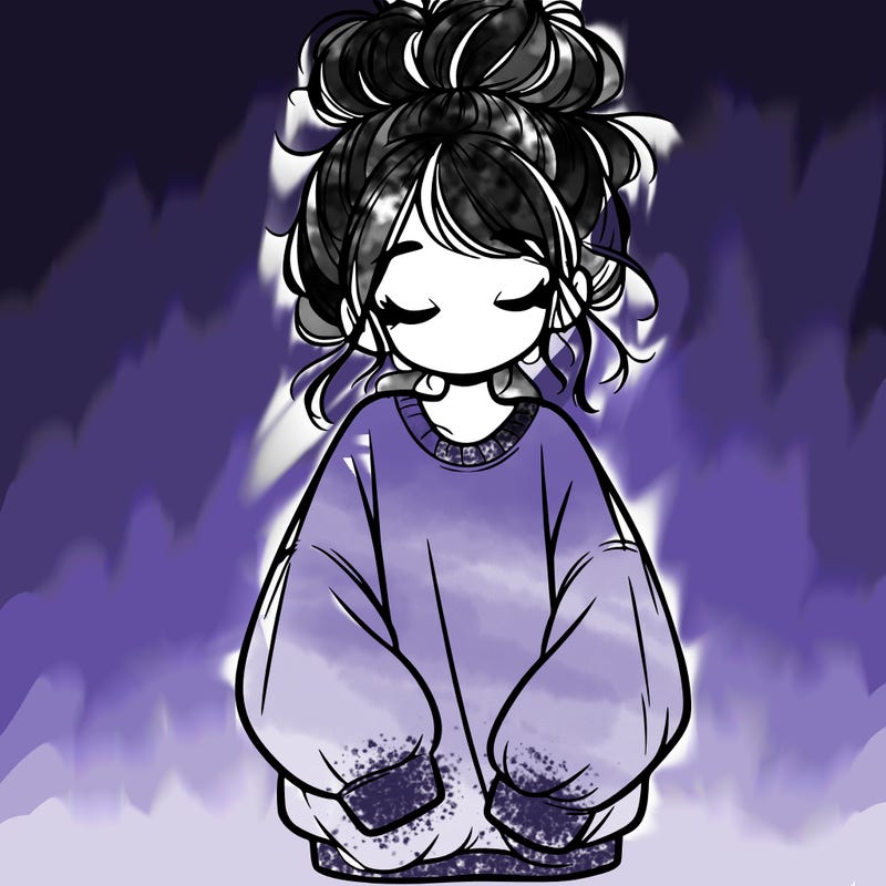 girl with baggy sweatshirt and messy bun