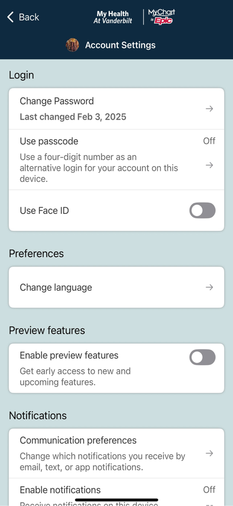 The account settings screen of the My Health at Vanderbilt app showing login options and notification preferences.