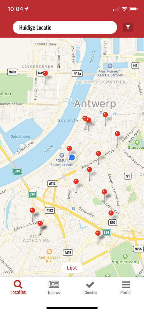 A map of Antwerp within the SNS-Pas app showing multiple sports facility locations marked with red pins.