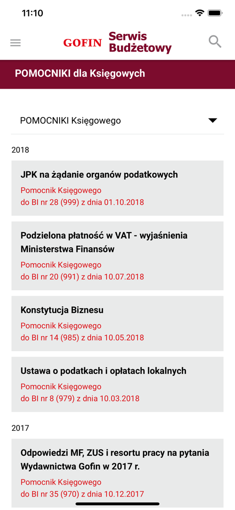 Mobile app interface of GOFIN Serwis Budzetowy showing a list of professional guides for accountants organized by year