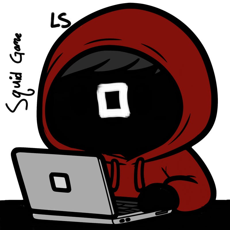 guy with a hoodie on his head on a laptop
