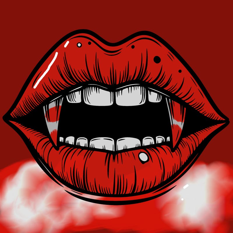lips with vampire teeth