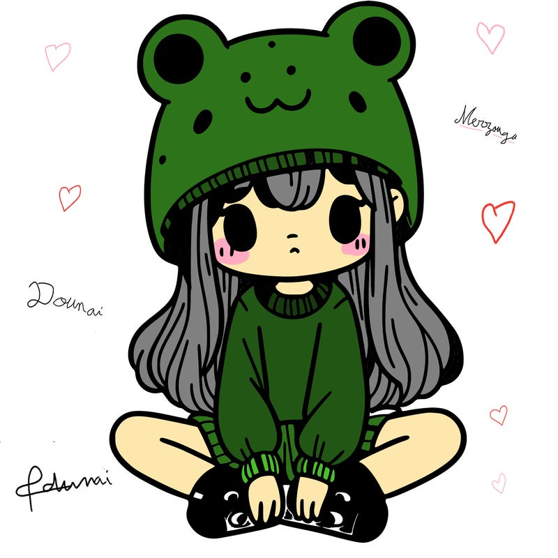 a girl wearing a frog hat and some frog socks