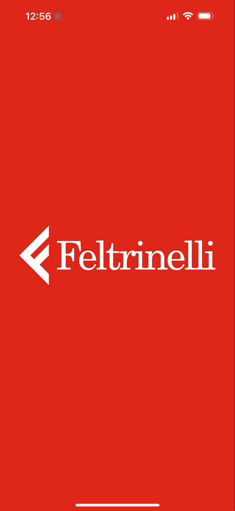 Feltrinelliアプリのスプラッシュスクリーン。白いロゴとテキストが赤い背景に表示されています。