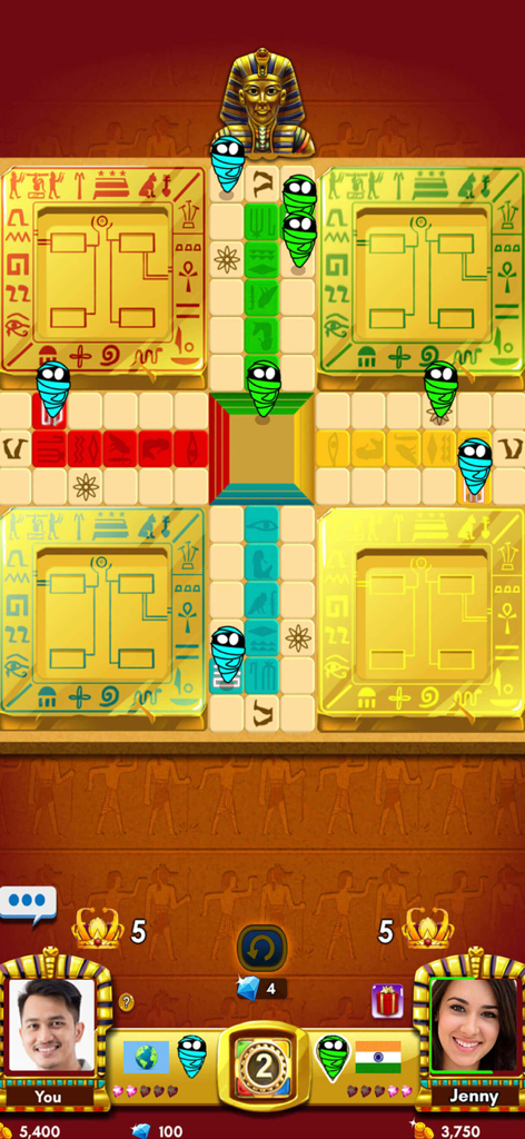 Ludo King gameplay featuring an Egyptian theme with mummy tokens and pharaoh graphics