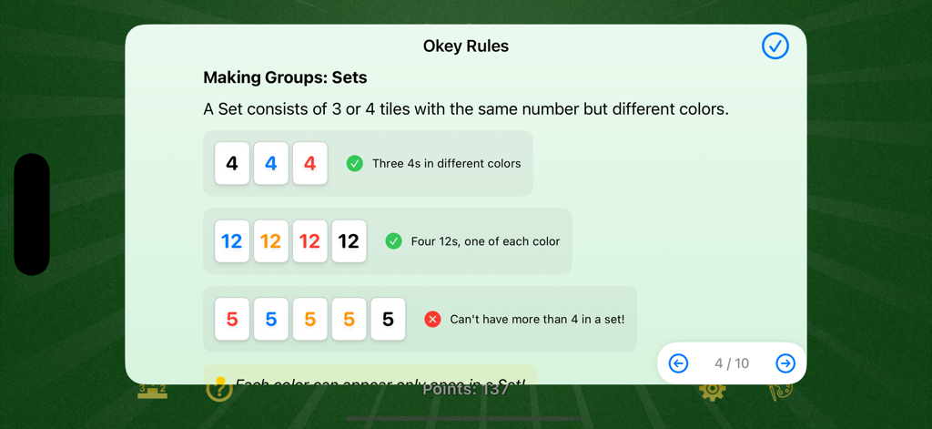 Okey Online - Una pantalla de tutorial de la aplicación Okey Online explicando cómo crear conjuntos válidos de fichas con números iguales y colores diferentes.