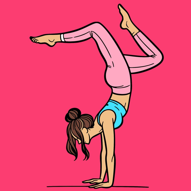 a woman doing a handstand
