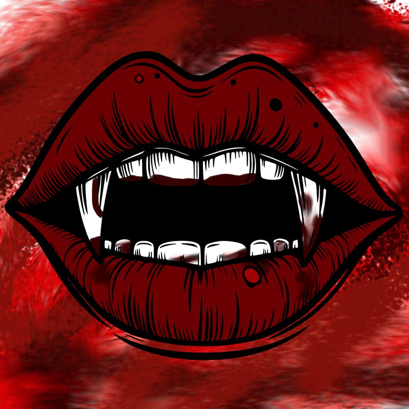 lips with vampire teeth