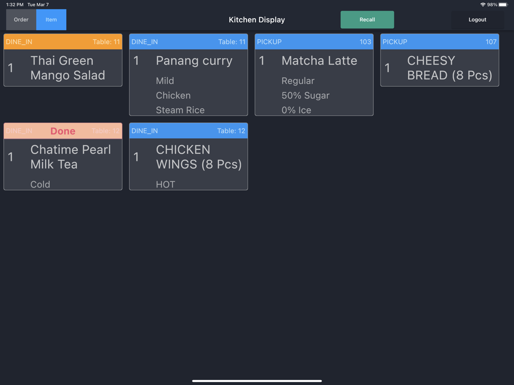 Snappy POS Kitchen Display - A digital kitchen display interface showing various restaurant food orders for dine in and pickup