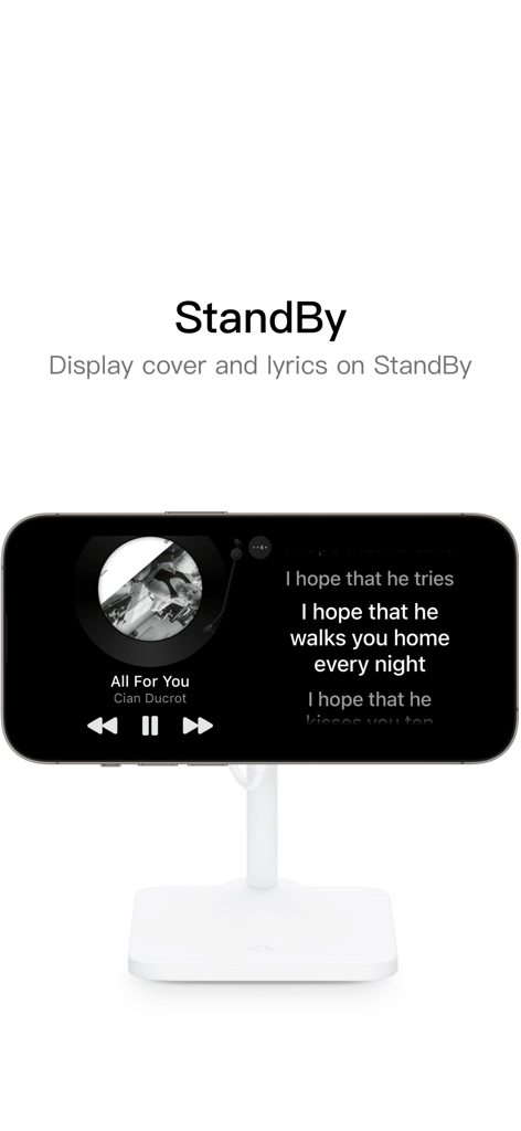 Dynamic-Lyrics - iPhone auf einem Ladeständer im StandBy-Modus, das Echtzeit-Musiktexte und Albumcover anzeigt
