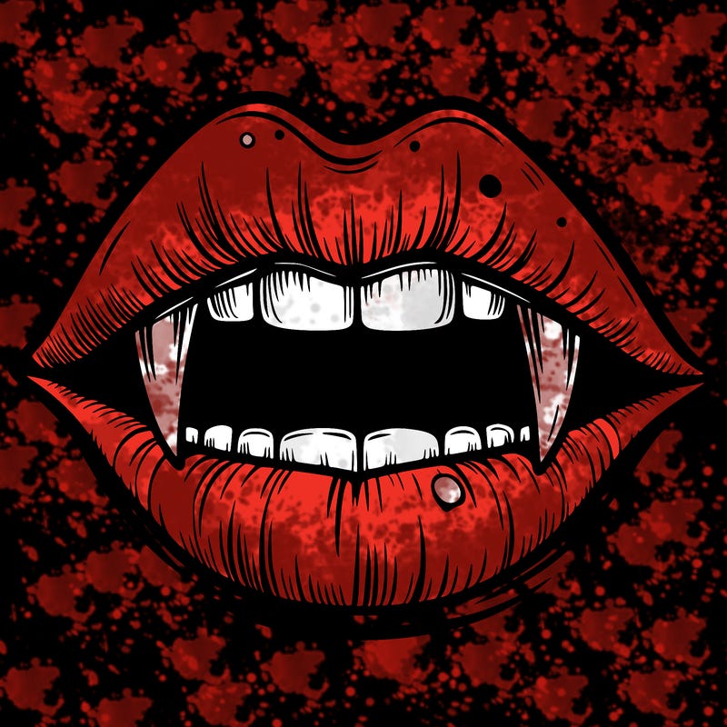 lips with vampire teeth