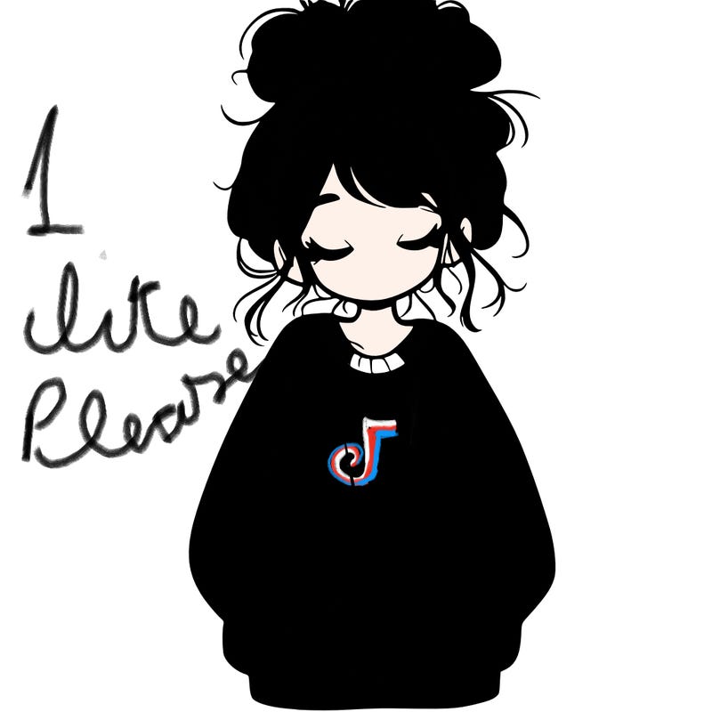 girl with baggy sweatshirt and messy bun