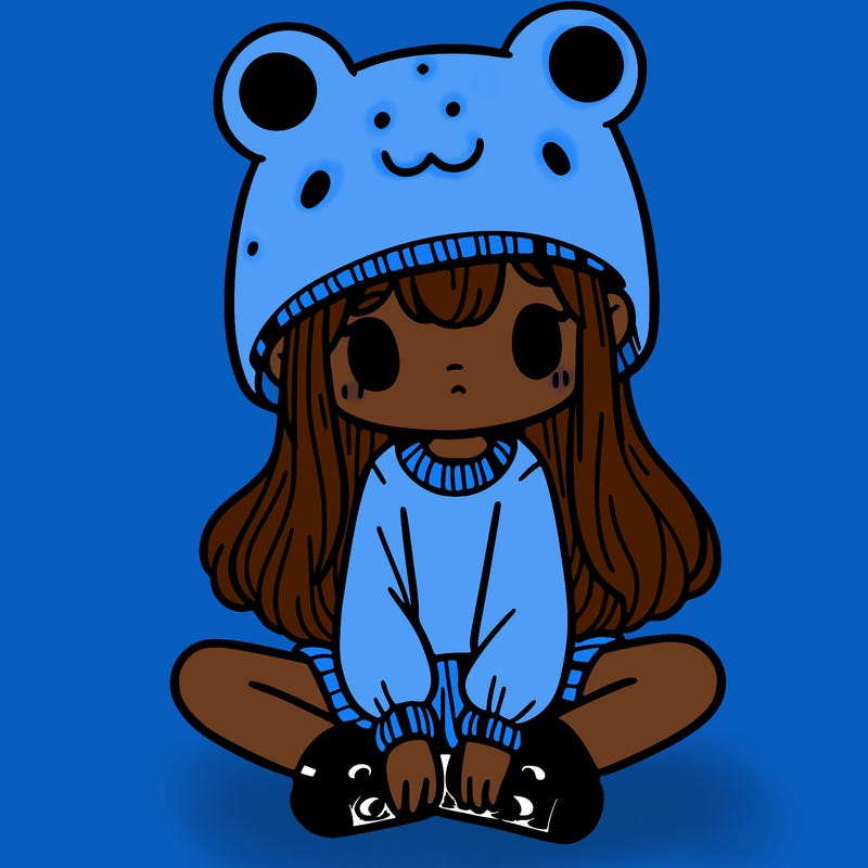 a girl wearing a frog hat and some frog socks