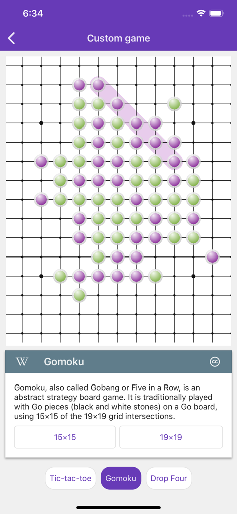 Tic Tac Toe Collection - A screenshot of the Tic Tac Toe Collection app showing a Gomoku custom game screen with purple and green pieces on a grid and a description of the game rules.