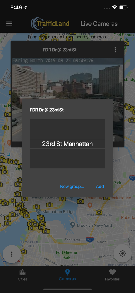 TrafficLand Live Cameras app interface showing a live traffic camera view and map of Manhattan