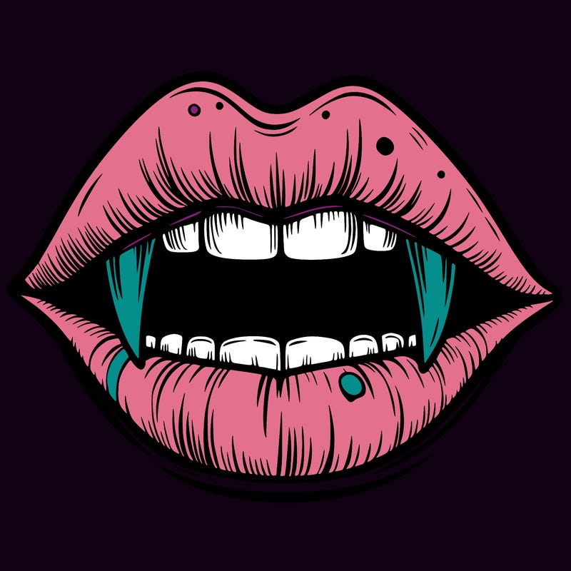 lips with vampire teeth